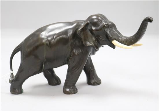 A Japanese bronze elephant, Meiji period, signed